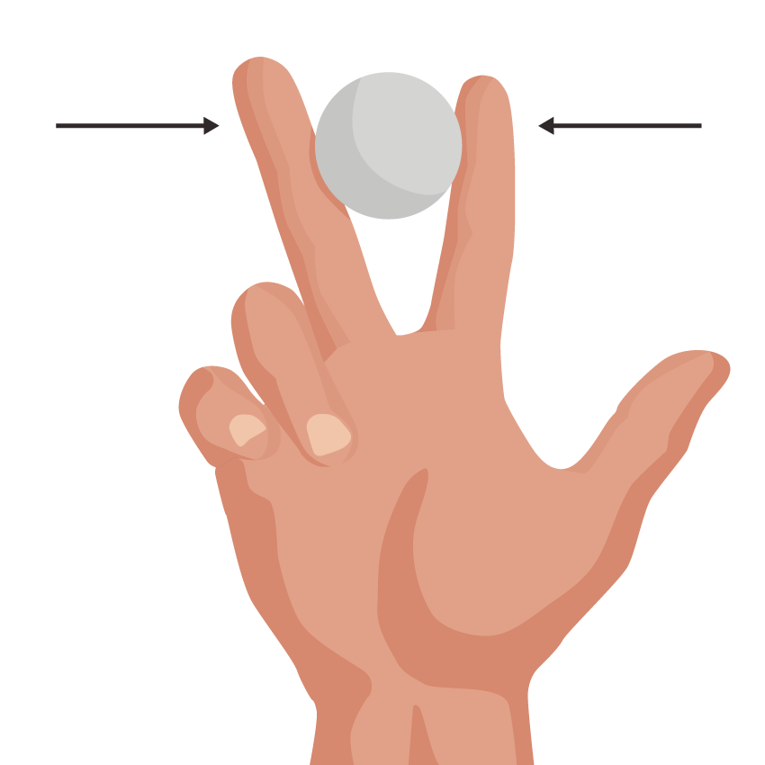 Close up image of person squeezing small ball in between two fingers